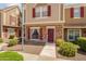 Attractive home featuring brick accents, red shutters, and nicely manicured landscaping for great curb appeal at 18811 N 34Th Ave # 6, Phoenix, AZ 85027