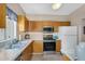 The kitchen features stainless steel appliances, wooden cabinets and plenty of counter space at 18811 N 34Th Ave # 6, Phoenix, AZ 85027