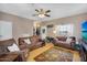 Inviting living room with bright natural light, hardwood floors, comfortable seating and view to the entry at 18811 N 34Th Ave # 6, Phoenix, AZ 85027
