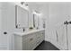 Elegant bathroom with double vanity, stylish mirrors, and modern fixtures for a luxurious feel at 18826 E Augusta Ave, Queen Creek, AZ 85142