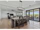 Open dining area that leads to the living room and backyard at 18826 E Augusta Ave, Queen Creek, AZ 85142