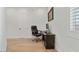 Home office with desk and chair, providing a conducive space for work and productivity at 18826 E Augusta Ave, Queen Creek, AZ 85142