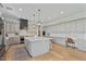 Spacious kitchen with stainless appliances, an island, and plenty of countertop space at 18826 E Augusta Ave, Queen Creek, AZ 85142