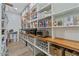 Walk-in pantry with custom shelves and plenty of storage space at 18826 E Augusta Ave, Queen Creek, AZ 85142