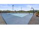 A well-maintained sports court with lighting for evening play, perfect for active recreation and friendly competition at 18826 E Augusta Ave, Queen Creek, AZ 85142