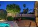 A lovely brick patio and lush backyard create a great private outdoor seating area and an exceptional ambiance at 19115 N 71St Dr, Glendale, AZ 85308