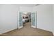 View from bedroom into living room, showcasing natural light and modern decor at 19225 N Tallowood Way, Surprise, AZ 85387