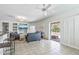 Neutral living area features an open patio and entertainment area at 19225 N Tallowood Way, Surprise, AZ 85387