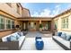 Stylized backyard featuring seating, grill and a covered patio, perfect for outdoor living at 20423 W Springfield St, Buckeye, AZ 85396