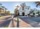 Attractive Main Market building with palm trees and ample street parking at 20423 W Springfield St, Buckeye, AZ 85396