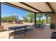 Covered picnic area overlooking the community playground, providing a comfortable space for Gathering outings at 20423 W Springfield St, Buckeye, AZ 85396