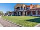 Beautiful clubhouse featuring well manicured lawns and walkways at 20581 N Enchantment Pass, Maricopa, AZ 85138