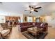 Open-concept floor plan with living room flowing into the kitchen at 20581 N Enchantment Pass, Maricopa, AZ 85138