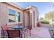 Private outdoor patio with comfortable seating, offering a relaxing space for entertaining or unwinding at 20581 N Enchantment Pass, Maricopa, AZ 85138