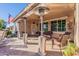 Outdoor patio with ceiling fan, patio furniture, and views of the landscape at 20581 N Enchantment Pass, Maricopa, AZ 85138