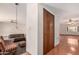 Comfortable living space with mixed flooring, traditional-style furniture, and warm lighting creates a welcoming ambiance at 2114 E Hale St, Mesa, AZ 85213