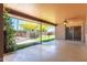 Relaxing covered patio offers a view of the fenced yard and pool at 2114 E Hale St, Mesa, AZ 85213