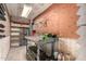 Organized workshop with pegboard, shelving, and a workbench at 2114 E Hale St, Mesa, AZ 85213