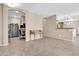 Open office space features a desk and an entryway into the eat-in kitchen at 2189 W Mila Way, San Tan Valley, AZ 85144