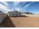 Spacious backyard with potential for landscaping and outdoor living at 22045 N Rummler Ln, Maricopa, AZ 85138