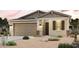Charming single-Gathering home with a two-car garage and desert landscaping at 22045 N Rummler Ln, Maricopa, AZ 85138