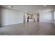 Expansive living area with tile flooring, recessed lighting, and an open layout at 22045 N Rummler Ln, Maricopa, AZ 85138