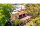 Aerial view of home showcasing brick-paved patio and wrought iron fencing at 2322 S Rogers -- # 1, Mesa, AZ 85202