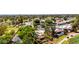 Beautiful aerial view of a villa on a golf course with lush trees and mature landscaping at 2322 S Rogers -- # 1, Mesa, AZ 85202