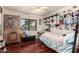 Cozy bedroom with wood floors and plenty of light offers a welcoming space at 2322 S Rogers -- # 1, Mesa, AZ 85202