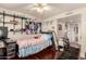 Comfortable bedroom featuring wood floors, closet space, and lots of light at 2322 S Rogers -- # 1, Mesa, AZ 85202
