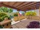 Enjoyable covered patio features a decorative stone pillar and serene outdoor living space, perfect for relaxation at 2322 S Rogers -- # 1, Mesa, AZ 85202