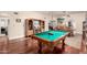 Open concept game room with pool table with views of dining area and other living spaces at 2322 S Rogers -- # 1, Mesa, AZ 85202