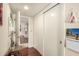 Hallway with hardwood floors and plenty of closet space and storage at 2322 S Rogers -- # 1, Mesa, AZ 85202