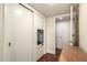 Hallway with built in storage and closet space on wood floors at 2322 S Rogers -- # 1, Mesa, AZ 85202