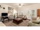 Comfortable living room featuring a plush seating arrangement, a large window, and stylish décor, perfect for relaxation at 2322 S Rogers -- # 1, Mesa, AZ 85202