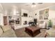 Spacious living room with a cozy fireplace and open layout, perfect for relaxation and entertaining at 2322 S Rogers -- # 1, Mesa, AZ 85202