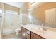 This well-lit bathroom features a shower-tub combo and single sink at 2323 W Kachina Trl, Phoenix, AZ 85041
