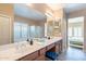 Bright primary bath with double sinks, lots of counter space, a walk in shower and soaking tub at 2323 W Kachina Trl, Phoenix, AZ 85041