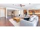 Spacious living room features a modern open floor plan with wood floors and neutral tones at 2323 W Kachina Trl, Phoenix, AZ 85041