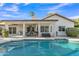 Relaxing backyard pool with covered patio, perfect for outdoor entertaining and leisure at 2333 E Egret Ct, Gilbert, AZ 85234