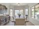 Bright dining room with a view to the pool, perfect for Gathering meals at 2333 E Egret Ct, Gilbert, AZ 85234