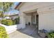 Inviting front porch with decorative plants and stone accents, enhancing the home's entrance at 2333 E Egret Ct, Gilbert, AZ 85234