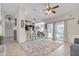 Bright living room with a view to backyard pool, bar seating and an open layout at 2333 E Egret Ct, Gilbert, AZ 85234