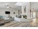 Spacious living room with a modern fireplace, high ceilings, and stylish decor at 2333 E Egret Ct, Gilbert, AZ 85234