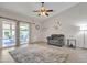 Cozy living room with natural light, patio access, and a comfortable seating area at 2333 E Egret Ct, Gilbert, AZ 85234