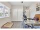 Bright home office space with carpet, window and ceiling fan at 2333 E Egret Ct, Gilbert, AZ 85234