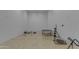 Spacious racquetball court with ping pong table and exercise equipment at 2333 E Egret Ct, Gilbert, AZ 85234