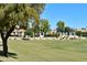 Scenic view of the community featuring a green belt with landscaping and a common structure at 2369 W Shawnee Dr, Chandler, AZ 85224