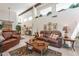 Open living area with high ceilings, tile flooring, and a comfortable seating arrangement at 2369 W Shawnee Dr, Chandler, AZ 85224
