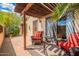 Relaxing outdoor patio area with comfortable seating and shaded pergola, perfect for entertaining at 2369 W Shawnee Dr, Chandler, AZ 85224